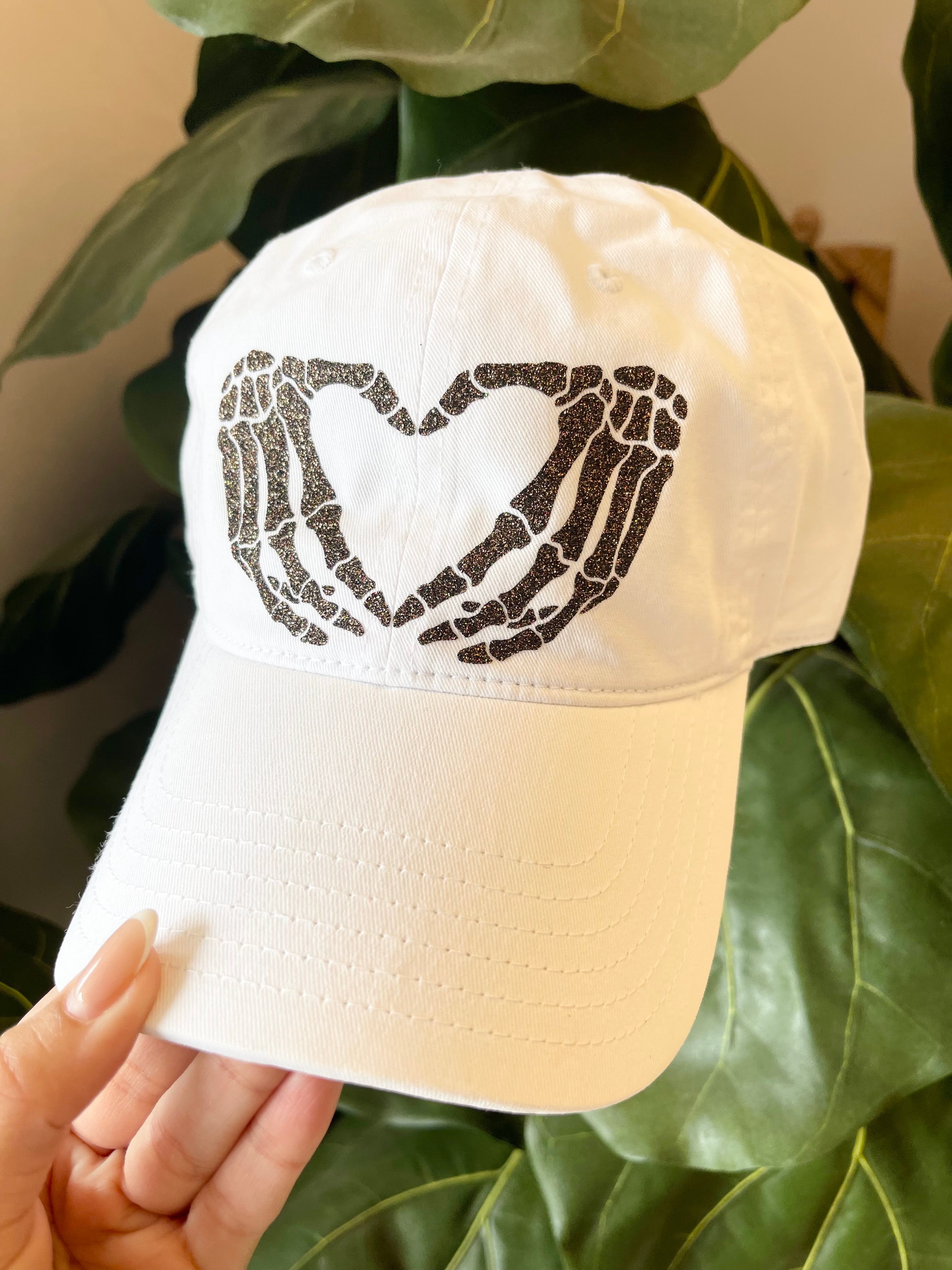 Skeleton Heart Hands Dad Hat Pink Laundry Skeleton Heart Hands Dad Hat Pink Laundry